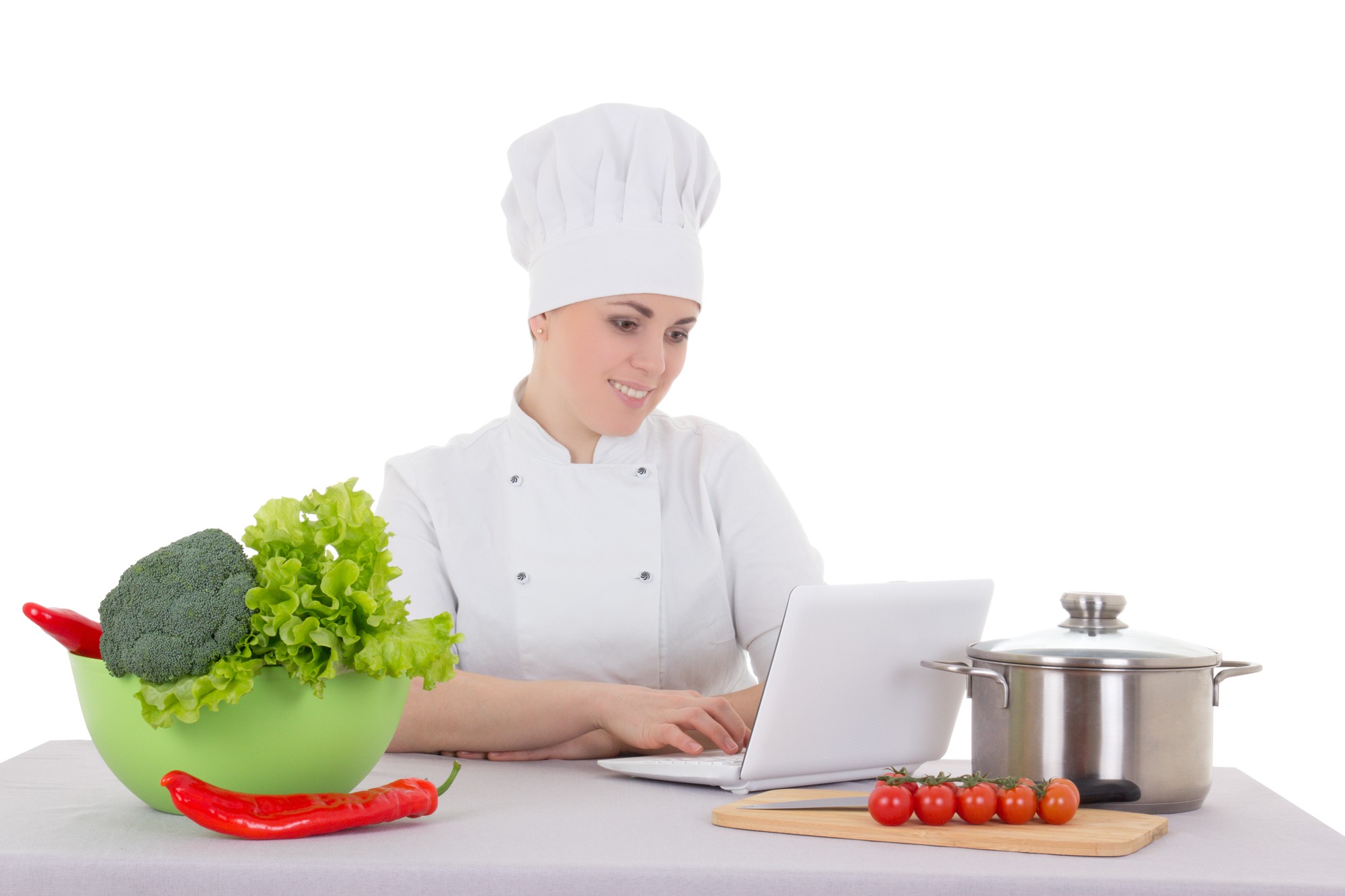 Chef teaching an online cooking masterclass via laptop